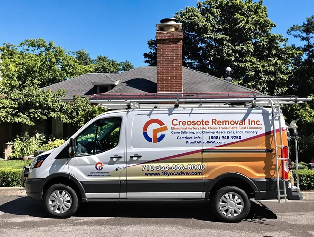 Lakewood Chimney Sweep technician removing creosote safely in Lakewood, CA